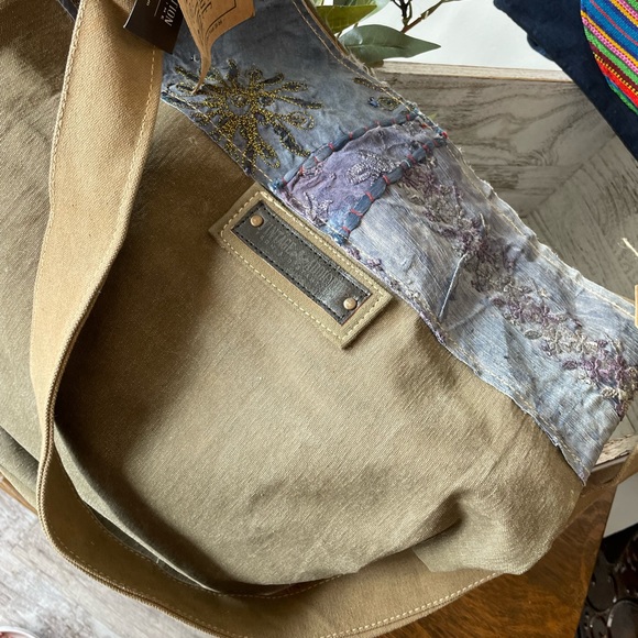 Crossbody purses made out of recycled army tents. - Picture 5 of 5